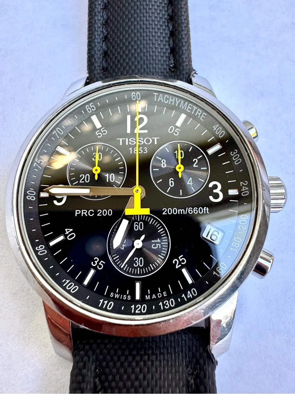 Tissot Black Dial Chronograph Watch with Yellow Accents